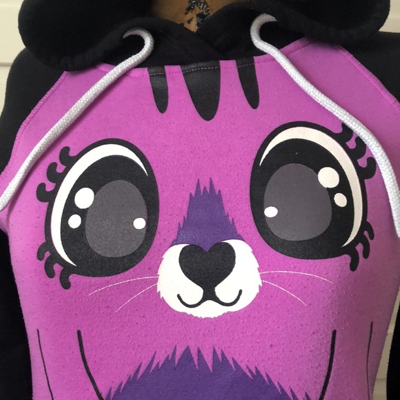 This is a purple cat faced sweater. - Picture 3 of 5